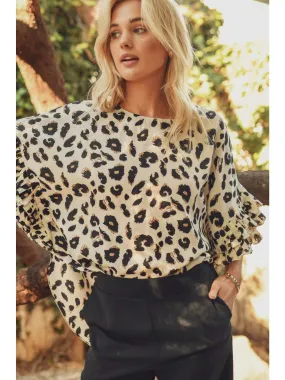 Leopard print top with dolman half sleeves featuring pleated ruffle detail